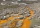 Откриено зошто реките во Алјаска стануваат портокалови